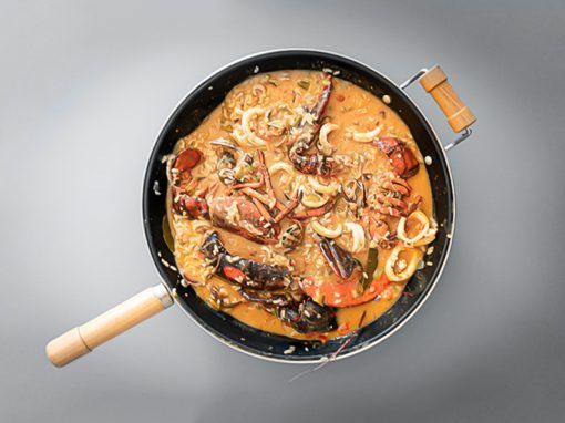 Arroz caldoso con bogavantes, calamares y almejas Arroz caldoso con bogavantes, calamares y almejas